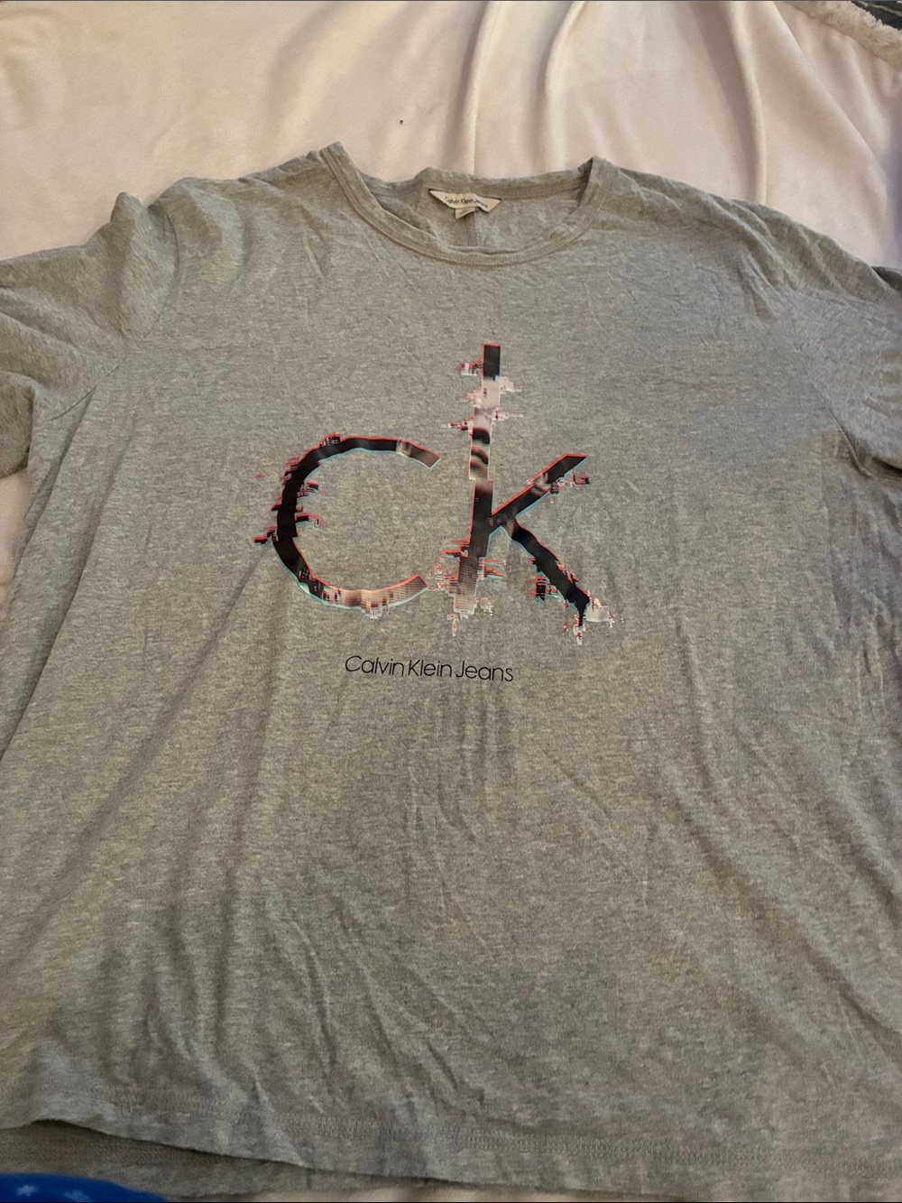 Calvin Klein Jeans Gray Tee with Distressed Multicolor CK Logo